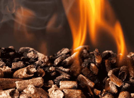 wood pellets ignited with flame