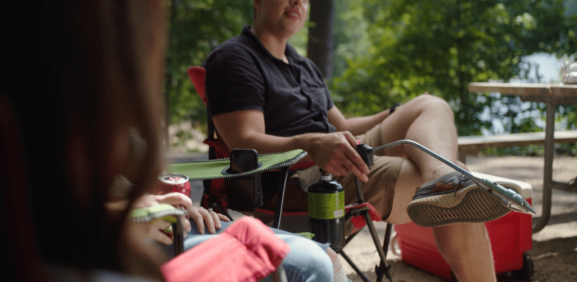 Gathering around campfire on chairs with Rocketfire