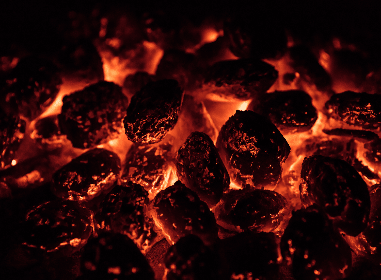 Lit charcoal grill